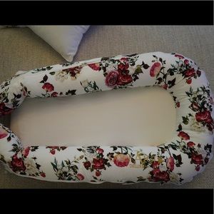 Dockatot Deluxe with the Floral Print Cover